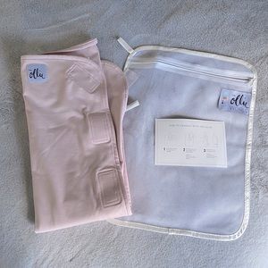 Like new Ollie swaddle with laundry bag